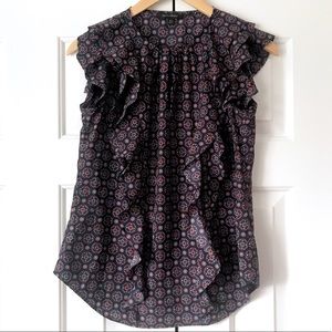 Banana republic ruffle top darling and retro look great for spring/summer look.